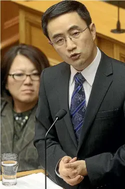  ?? PHOTO: KEVIN STENT/STUFF ?? Two-term National list MP Jian Yang gives his maiden speech in Parliament. He has been caught up in awkward questions about links to spying.