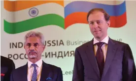  ?? Photograph: Anadolu Agency/ Getty Images ?? Indian foreign minister S Jaishankar and Russian deputy prime minister Denis Manturov at the India-Russia Business Dialogue meeting in New Delhi.