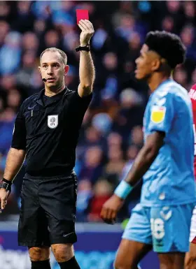  ?? ?? Referee Jeremy Simpson shows a red card to Coventry’s Ian Maatsen