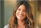  ?? ABC ?? Gina Rodriguez stars as a newspaper obituary writer who sees the ghosts of her subjects in “Not Dead Yet.”