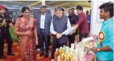  ?? ?? Governor RN Ravi and TNAU V-C V Geethalaks­hmi looking at the exhibits in Coimbatore on Friday