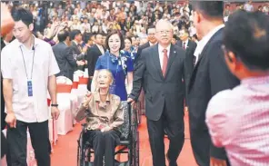  ?? PHOTOS BY ZHOU LICHAO / FOR CHINA DAILY ?? Alumni young and old (above), and students from home and abroad (top), of Zhejiang University attend ZJU’s 120th anniversar­y on May 21 in Hangzhou.