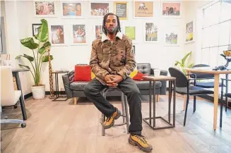  ?? Allen G. Breed/Associated Press ?? Community organizer Chase Madkins poses for a portrait in a Black-owned coffee shop in Memphis, Tenn. Madkins says Black men like he and Tyre Nichols are often pulled over by police own flimsy pretexts hopes of finding some more serious violation.