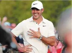  ?? ?? Brooks Koepka reacts during the trophy ceremony after winning the 2023 PGA Championsh­ip at Oak Hill Country Club in Rochester, N.Y., on Sunday.