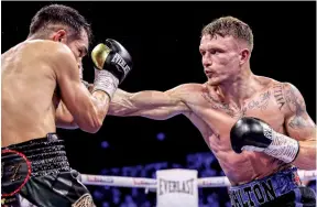  ?? Photo: GEORGE WOOD/GETTY IMAGES ?? EDUCATION: Smith [right] hasn’t boxed an opponent with a losing record since his fourth pro bout