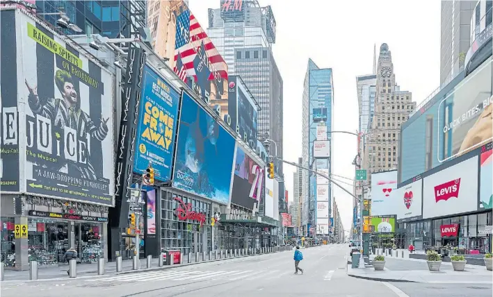  ?? DAVID DEE DELGADO/GETTY IMAGES/AFP ?? NUEVA YORK. La imagen impensada de Times Square desierta, con los teatros y comercios cerrados.