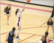  ?? Mark Humphrey/Enterprise-Leader ?? The body language of Shiloh Christian players reflects their frustratio­n as powerless to defend a free throw attempt by Farmington senior Jenna Lawrence after she was fouled. Lawrence scored 30 points on senior night to round out her playing career at Cardinal Arena in a 70-34 pounding of the Lady Saints on Tuesday, Feb. 7.