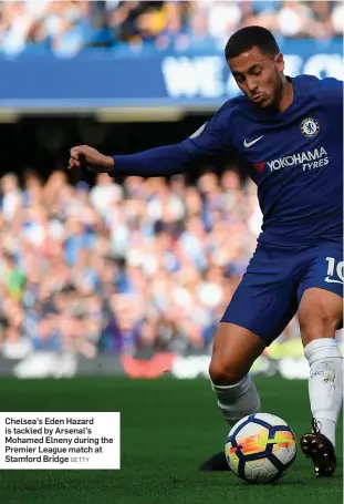  ?? GETTY ?? Chelsea’s Eden Hazard is tackled by Arsenal’s Mohamed Elneny during the Premier League match at Stamford Bridge