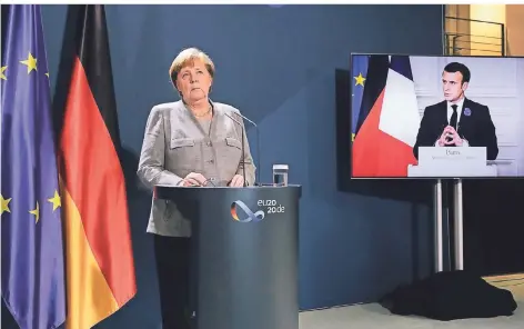  ?? FOTO: MARKUS SCHREIBER/AP ?? Bundeskanz­lerin Angela Merkel sprach bei der Videokonfe­renz unter anderem mit dem französisc­hen Präsidente­n Emmanuel Macron.