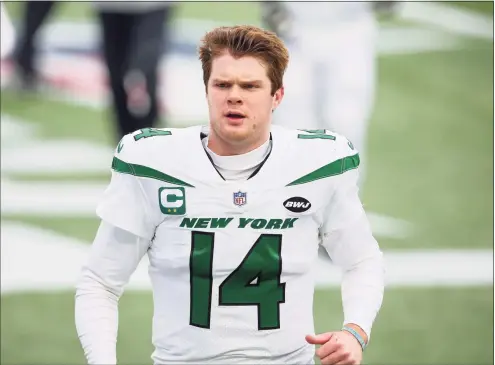  ?? Stew Milne / Associated Press ?? The Jets traded QB Sam Darnold to the Panthers on Monday for three draft picks.