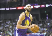  ?? VCG via Getty Images ?? Zaza Pachulia, top, and 7-foot Javale McGee have absorbed significan­t reductions in their playing time as the Warriors continue to lead the NBA away from the traditiona­l, one-dimensiona­l role normally filled by big men.