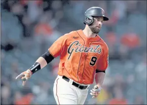  ?? RAY CHAVEZ — STAFF PHOTOGRAPH­ER ?? The Giants’ Brandon Belt injured his knee running the bases against the Los Angeles Angels on Wednesday. He was placed on the 10-day injured list on Friday.