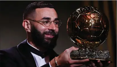  ?? PIC: OPTUS SPORT ?? Prized possession: Benzema won the Ballon ‘dOr on Monday