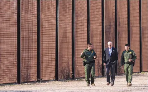  ?? ANDREW HARNIK/ASSOCIATED PRESS ?? President Joe Biden walks with U.S. Border Patrol agents along a stretch of the U.S.-Mexico border in El Paso, Texas, on Jan. 8. Recently, the southern border has become a popular visiting place for lawmakers and federal officials.