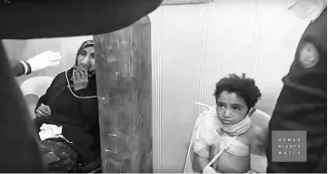  ??  ?? A still image from an undated video provided to Reuters by Human Rights Watch claiming to show people treated in Aleppo, Syria, following a gas attack. — Reuters photo