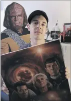  ?? NICK PROCAYLO/PNG ?? Local Star Trek podcast co-host Cam Smith, shown with some of his memorabili­a, says he was shocked at the news of Leonard Nimoy’s death.