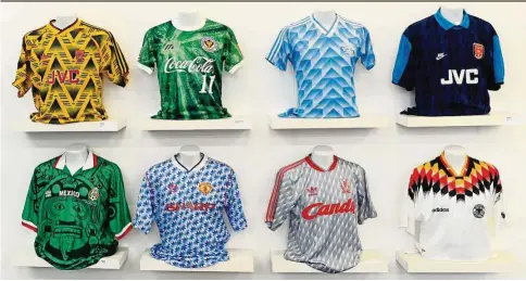  ?? — Photos: AFP ?? Football shirts (from left, top) from Arsenal’s ‘bruised banana’ top from 1991, a Japanese club, a Netherland­s away shirt, an Arsenal away shirt; (from left, bottom) a 1998 Mexico shirt, a 1992 Manchester United away shirt, a 1989-1991 Liverpool away...