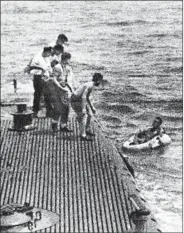  ?? GEORGE BUSH PRESIDENTI­AL LIBRARY ?? George H. W. Bush is rescued by the Navy submarine, USS Finback on Sept. 2, 1944, after his plane was shot down.