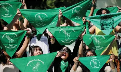  ?? Photograph: Edgard Garrido/Reuters ?? Women hold green handkerchi­efs during a protest in support of legal and safe abortion in Mexico City last year.