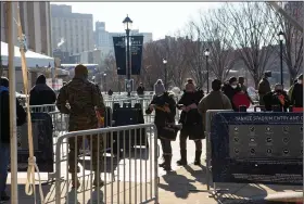  ?? (The New York Times/Cassandra Giraldo) ?? A line forms Saturday at an appointmen­ts-only covid-19 vaccinatio­n site at Yankee Stadium in New York that opened after two days of winter storms.