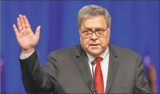  ?? David Grunfeld / Associated Press ?? United States Attorney General William Barr waves to the crowd after addressing the Grand Lodge Fraternal Order of Police's 64th National Biennial Conference in New Orleans on Monday. Barr said Monday that there were “serious irregulari­ties” at the federal jail where Jeffrey Epstein took his own life this weekend as he awaited trial on charges he sexually abused underage girls.