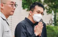  ?? Photo: Yik Yeung-man ?? Eddie Chau accepts condolence­s during the vigil for his daughter at the Diamond Hill Funeral Parlour yesterday.