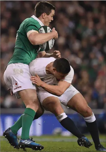  ??  ?? Jonathan Sexton of Ireland is tackled by Ben Youngs of England during last year’s RBS Six Nations Championsh­ip. A St. Patrick’s Day Twickenham showdown between the sides is certainly something to look forward to.