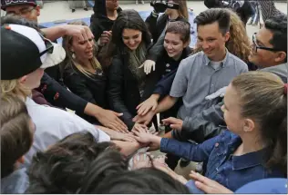  ?? Signal file photo ?? West Ranch students and teacher, Christine Hirst, gather to do cheer ahead of their high altitude balloon launch in May 2017. Hirst has received a grant in order to expand the astronomy program at the school.