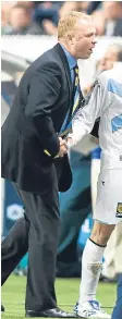  ??  ?? McLeish shakes hands with James McFadden after his 2007 winner in Paris.