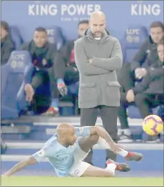  ??  ?? File photo shows Manchester City’s Fabian Delph in action as manager Pep Guardiola looks on. — Reuters photo