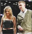  ?? Ap photo ?? Eugenie Bouchard and her blind date, John Goehrke, attend an NBA game between the Brooklyn Nets and the Milwaukee Bucks on Wednesday in New York.