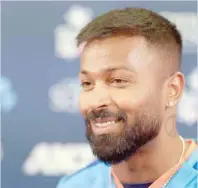  ?? — AFP ?? Indian captain Hardik Pandya speaks to media as heavy rain forced the cancellati­on of the opening Twenty20 match against New Zealand at Sky Stadium in Wellington.