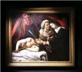  ??  ?? In this file photo taken on June 15, 2019, a painting believed by some experts to be Caravaggio’s “Judith Beheading Holofernes” is pictured at the Marc Labarbe auction house, in Toulouse.