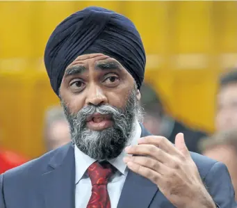  ?? SEAN KILPATRICK/THE CANADIAN PRESS ?? Defence Minister Harjit Sajjan responds to a question in the House of Commons in Ottawa earlier this week. Sajjan announced on Thursday tax breaks for all military personnel deployed on major operations abroad.