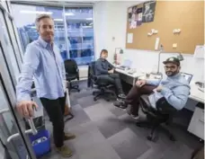  ??  ?? Andrew Carty, Simon Craig and J.P. Gravina work at the King St. location.