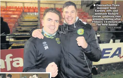  ?? PAUL EVANS ?? ● Caernarfon Town’s Noah Edwards (maroon kit) won this battle to the ball with Aeron Edwards of TNS to prevent a goal ● Caernarfon Town manager Sean Eardley (left) and assistant Richard Davies celebrate that winning feeling after Friday’s 1-0 victory at The New Saints