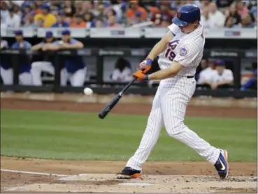  ?? FRANK FRANKLIN II — THE ASSOCIATED PRESS ?? New York Mets’ Jay Bruce hits a three-run home run during the first inning against the Colorado Rockies.