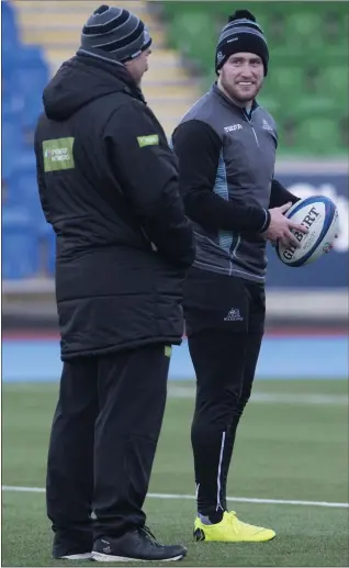  ??  ?? Stuart Hogg and Dave Rennie shoot the breeze in training at Scotstoun ahead of the game against Lyon