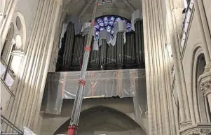  ?? | PHOTO : OUEST-FRANCE ?? Le remontage des 8 000 tuyaux du grand orgue est en cours.