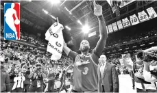  ?? - AFP photo ?? Dwyane Wade #3 of the Miami Heat reacts after hitting the game winning basket against the Golden State Warriors at American Airlines Arena in Miami, Florida.