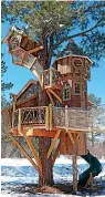  ?? Aaron Smith via AP ?? ■ Aaron Smith and his Colorado firm built this Pagosa Springs treehouset. Smith said interest in treehouses has increased in the last few years.