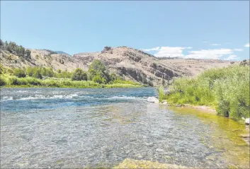  ??  ?? The Green River below the Flaming Gorge Dam is a fly-fisherman’s paradise.