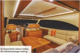  ??  ?? Enclosed deck saloon makes for refined passage-making