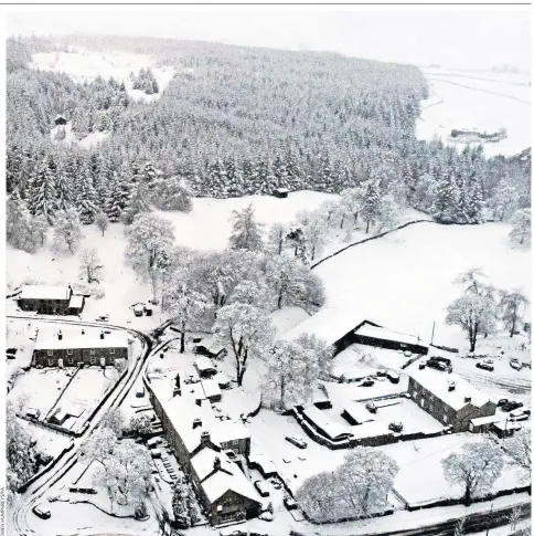  ??  ?? The scene in Allenheads, Northumber­land, early yesterday after temperatur­es dipped below freezing and snow fell across a band of northern England and southern Scotland