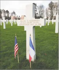  ?? Contribute­d photo ?? A cross marks the grave of U. S. Army Lt. Frank C. Godfrey, of Norwalk, at Oise- Aisne American Cemetery in Seringes- et- Nesles, France. Godfrey was killed in action at Chateau- Thierry, France, on Aug. 30, 1918, as he led an assault on German machine gun nests.