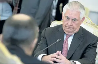  ?? ALEXANDER ZEMLIANICH­ENKO/AP ?? U.S. Secretary of State Rex Tillerson listens to Russian Foreign Minister Sergey Lavrov on Wednesday in Moscow.