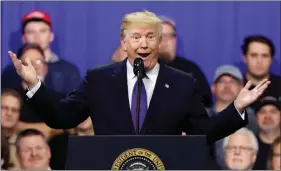  ?? EVAN VUCCI / AP ?? President Donald Trump gestures during a speech on tax policy during a visit to Sheffer Corp. on Feb. 5 in Blue Ash, Ohio.