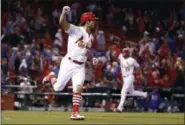  ?? JEFF ROBERSON — THE ASSOCIATED PRESS ?? The Cardinals’ Randal Grichuk celebrates after hitting a walkoff single to defeat the Cubs on April 2 in St. Louis.