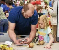  ?? JESI YOST - DIGITAL FIRST MEDIA ?? STEM Maker Station included a potato powered clock.