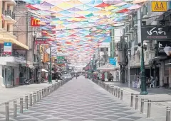  ?? NUTTHAWAT WICHEANBUT ?? Normally a Songkran magnet attraction, Khao San Road lies almost deserted as water throwing has been cancelled again this year.